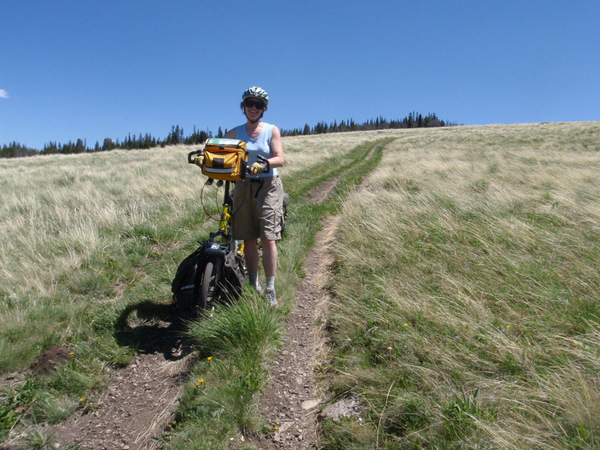 We dismounted and guided our loaded tandem bike downhill.